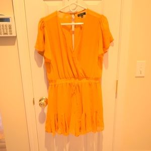 Romper with ruffled skirted bottom